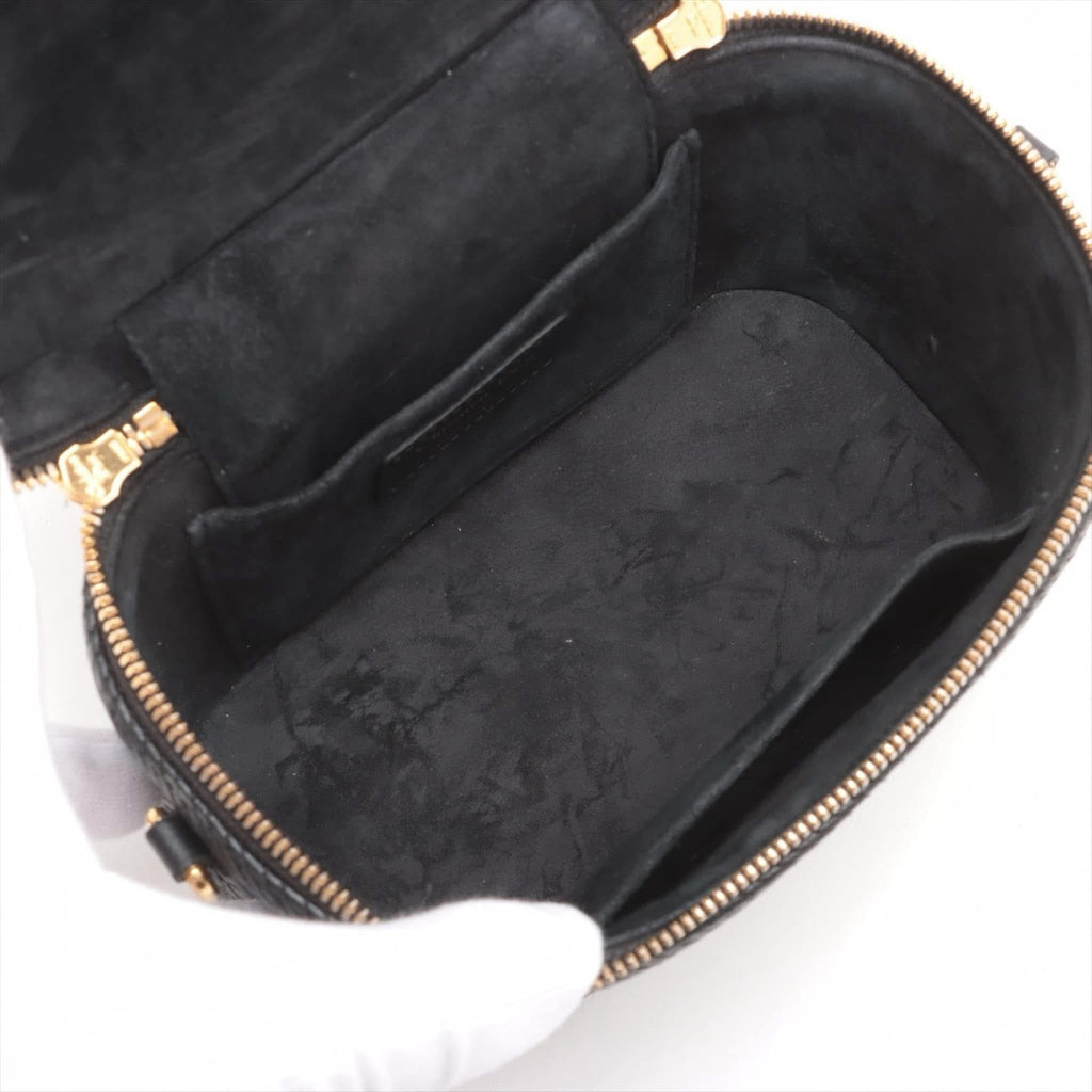 Christian Dior
Cannage Camera Bag
c. Late 2010s to Early 2020s